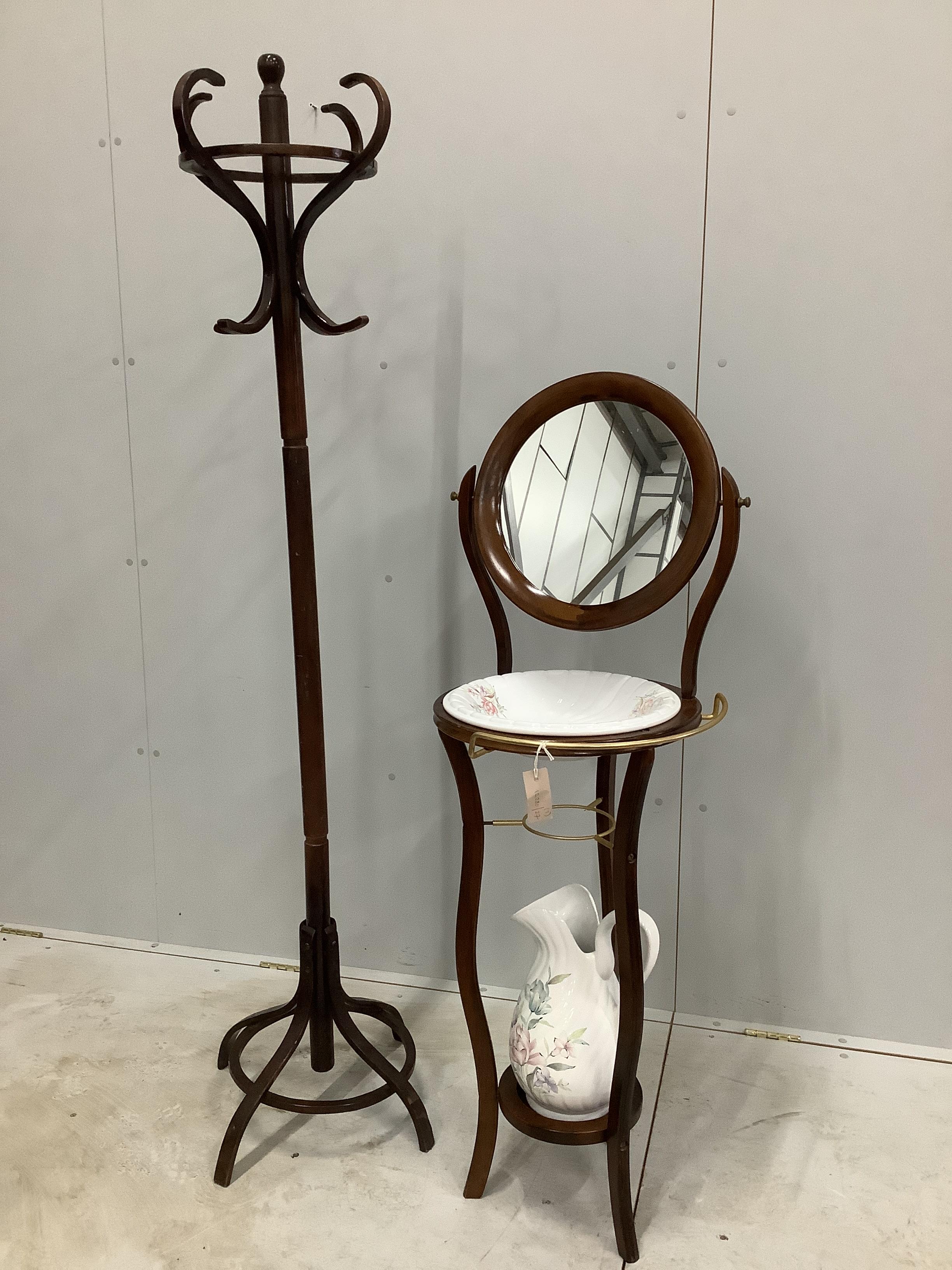 A Victorian style brass mounted mahogany washstand with pottery jug and basin, height 132cm, together with a bentwood coat stand